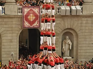 Castellers building a human tower