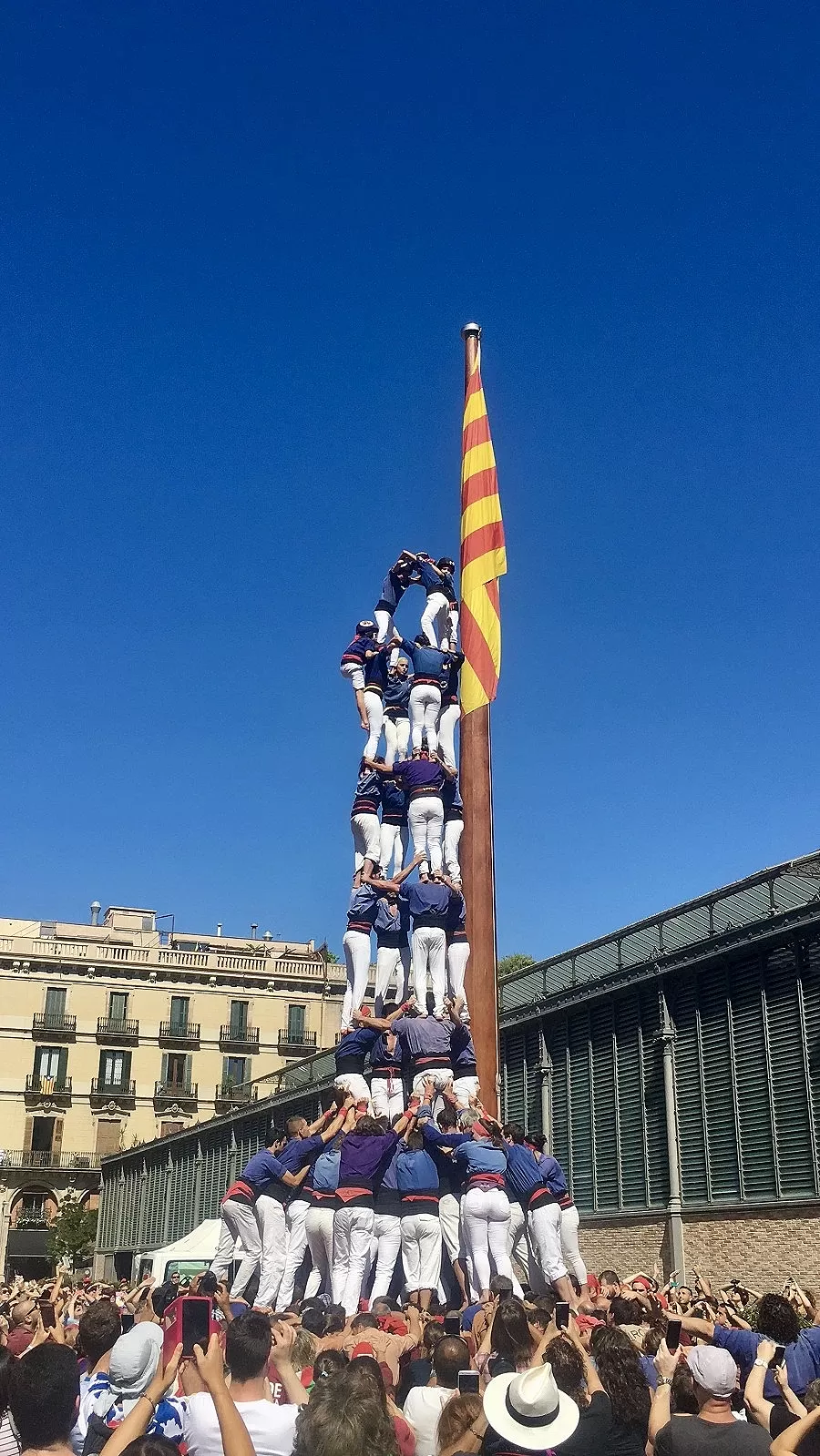 Castellers building a human tower in el Born, Barcelona