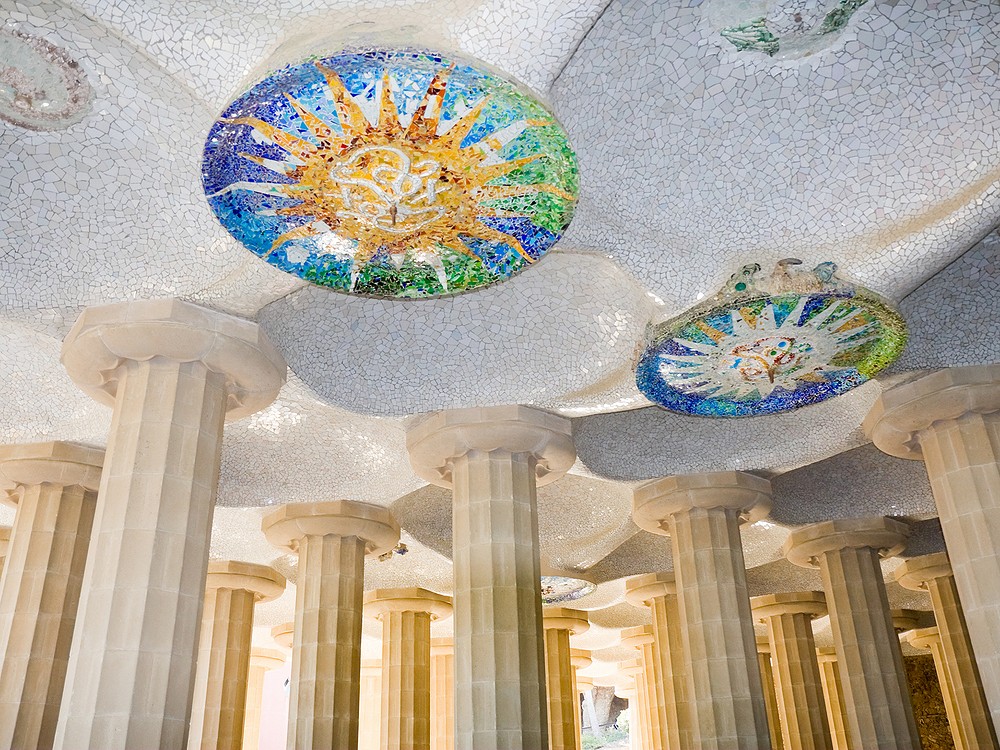 Pillars and a mosaic ceiling in Parc Guell